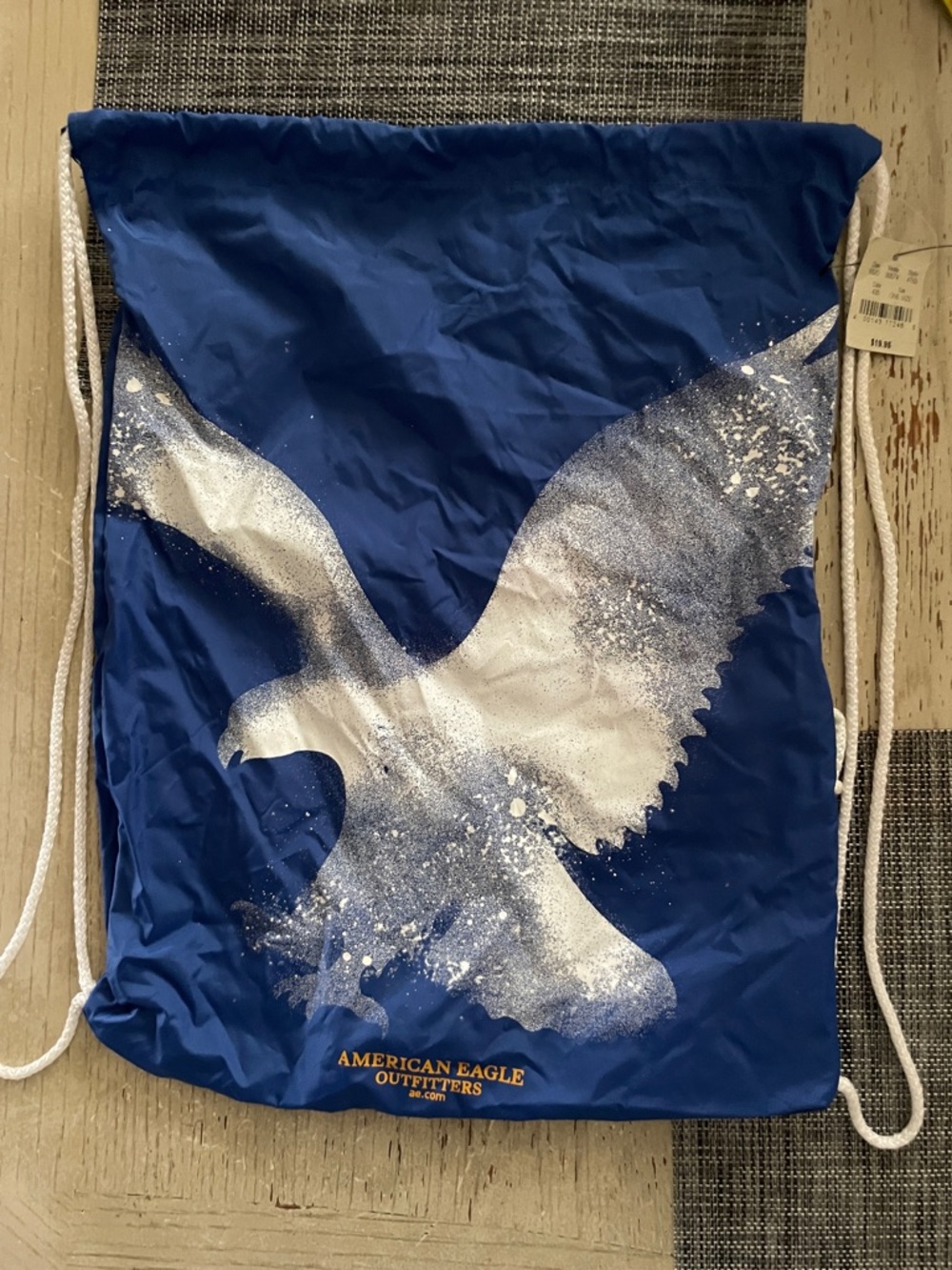 American Eagle Outfitters Royal Blue Drawstring Backpack with White Eagle Print